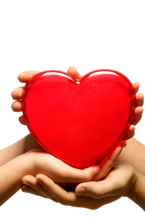 two ahnds holding a heart