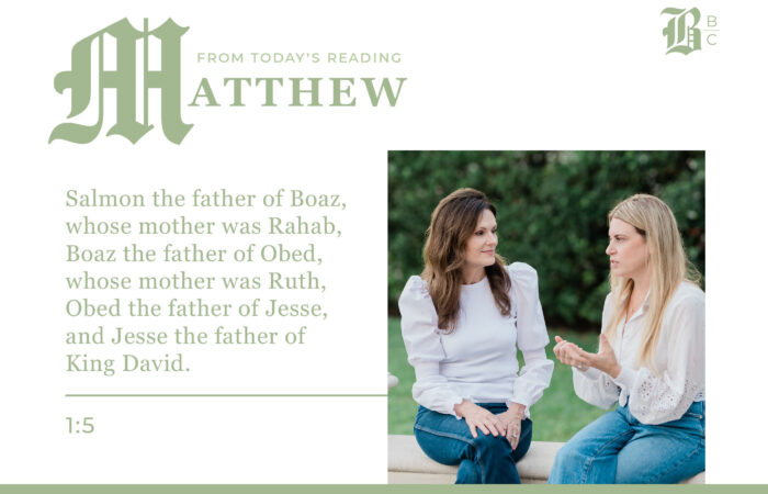 Two women discussing Rahab's mention in Matthew 1:5 during outdoor Bible study.